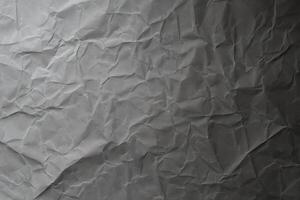 Design space grey crumpled paper textured background. photo