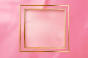 Golden frame on pink abstract background. photo