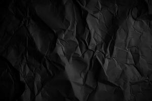 Design space black and dark crumpled paper textured background. photo