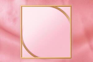 Golden frame on pink abstract background. photo