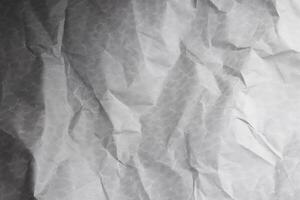 Design space grey crumpled paper textured background. photo