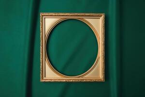 Golden frame on green background. photo