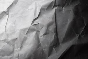 Design space grey crumpled paper textured background. photo