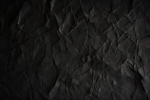 Design space black and dark crumpled paper textured background. photo