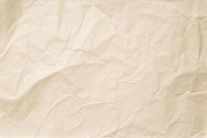 Design space beige crumpled paper textured background. photo
