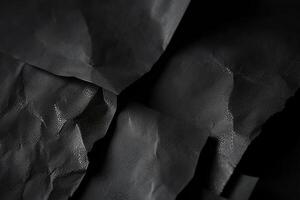 Design space black and dark crumpled paper textured background. photo