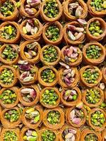 Oriental sweets close up. Baklava with pistachios photo