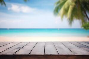 Table in front of blurred tropical beach of summer time background. photo