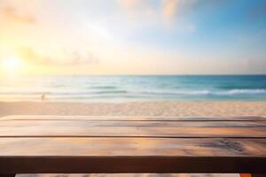 Table in front of blurred tropical beach of summer time background. photo
