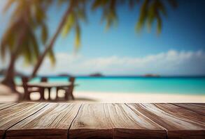 Table in front of blurred tropical beach of summer time background. photo