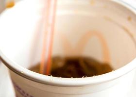 Soft drinks with ice in a plastic cup photo