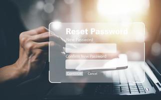 Security and reset password login online concept  Hands typing and entering username and password of social media, log in with smartphone to an online bank account, data protection from hacker photo