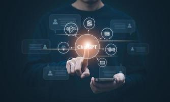 Businessman hold Laptop and touch Chat bot Chat with AI, Artificial Intelligence, System Artificial intelligence an artificial intelligence chatbot, Digital chatbot, Robot application, conversation photo