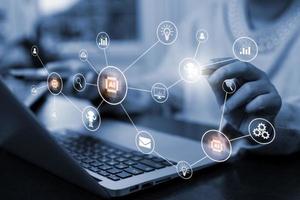 AI Artificial intelligence with hologram technology concept, businesswoman touch AI digital marketing, Big data, futuristic business, coding software development on the interface,IoT and innovation. photo