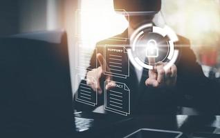 Hand using laptop and touch folder of document Management System, online documentation database and process automation to efficiently manage files work, knowledge, Corporate business technology, photo