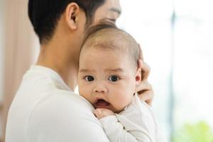 image of asian father and son at home photo