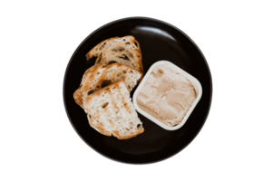 Black plate with toast bread and deep isolated on a transparent background png