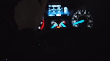 Close-up view of the male hands on the steering wheel driving the car video