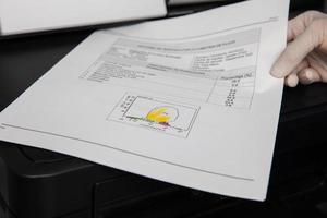 Scientist showing a patient flow cytometry test report. Flow cytometry. photo