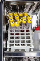 Test tubes with blood samples in the incubator during the process of preparation for karyotype and fluorescence in situ hybridization - FISH in the laboratory photo