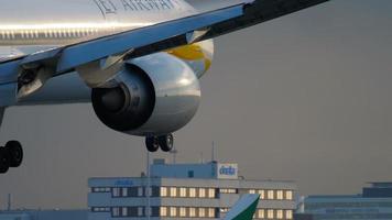 AMSTERDAM, THE NETHERLANDS JULY 25, 2017 - Jet Airways Boeing 777 VT JEQ approaching before landing at runway 06 Kaagbaan at sunrise, slow motion. Shiphol Airport, Amsterdam, Holland video