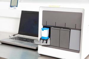 Thermal cycler machine in a molecular biology laboratory. Polymerase chain reaction technique. PCR technique photo