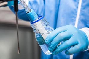Scientist using a ph meter at laboratory photo