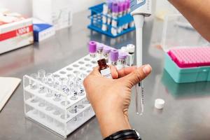 Scientist preparing samples for flow cytometric analysis using a monoclonal antibody. photo