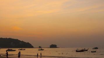 Timelapse of sunset over ocean landscape, Nai Harn beach, Phuket, Thailand video