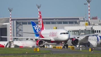 DUSSELDORF, GERMANY JULY 21, 2017 - Airberlin Airbus 320 taxiing to the start at sunset. Dusseldorf airport, Germany video