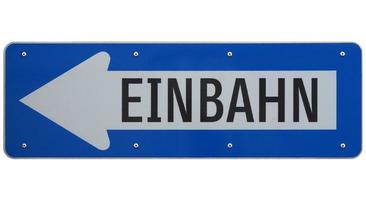 German one way street sign isolated over white, left arrow photo