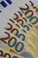 200 euro banknotes european bill cash money isolated on black background two hundred euro close up modern high quality instant stock print photo