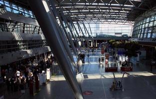 Dusseldorf, Germany, Wednesday 12 April 2023 International airport people walking and traveling in europe high quality background holidays prints photo