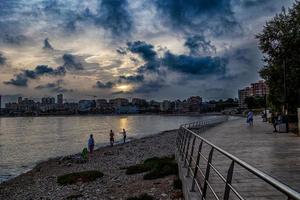 seaside landscape with sunset Alicante Spain with clouds in the sky photo