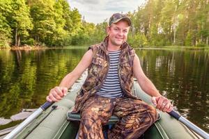 Fisherman in a boat photo