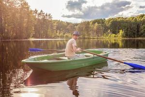 Fisherman in a boat photo