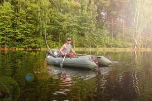 Fisherman in a boat photo