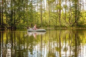 Fisherman in a boat photo