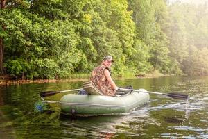 Fisherman in a boat photo