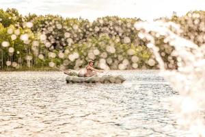 Fisherman in a boat photo