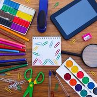 Stationery objects. Office and school supplies on the table. back to school. photo