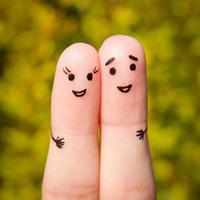 Finger art of a Happy couple. A man and a woman hug photo