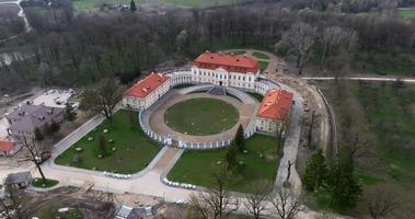 aerial view on overlooking restoration of the historic castle or palace near lake video