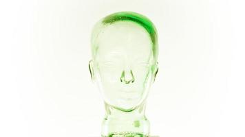 a clear glass mannequin head spinning video