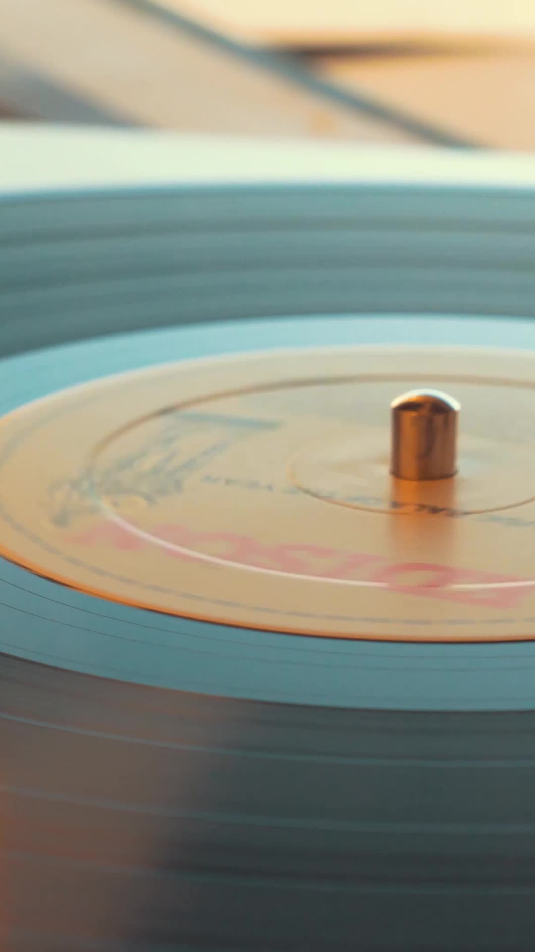 A record player spinning while the sun is setting 22760101 Stock Video