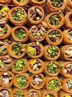 Oriental sweets close up. Baklava with pistachios photo