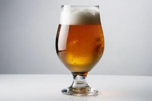 A big glass of beer on a white background created with technology. photo