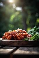 Chunks of chicken in a spicy sauce and sesame seeds. From a series of Food Korean cuisine. photo