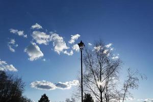 Low Angle View of Local Public Park and Beautiful Trees a Clear and Cold Day of 24-March-2023 at Luton Town of England UK. photo