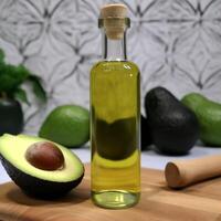 A bottle of olive oil avacado photo